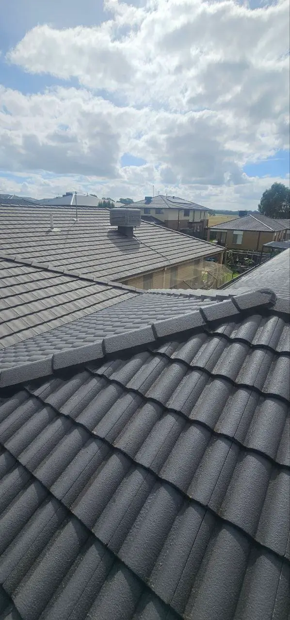 Concrete tile roof restored and resprayed in charcoal, Melbourne — project 2