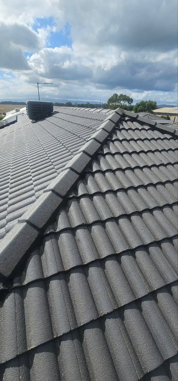 Concrete tile roof restored and resprayed in charcoal, Melbourne — project 4