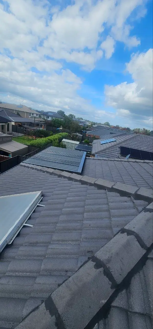 Concrete tile roof restored and resprayed in charcoal, Melbourne — project 10