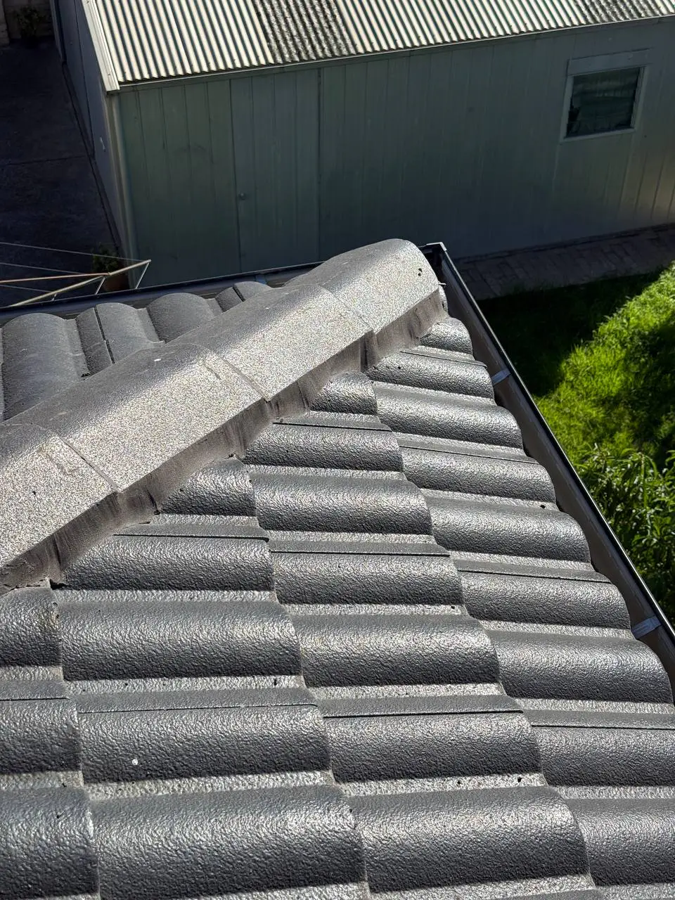 Concrete tile roof restored and resprayed in charcoal, Melbourne — project 15