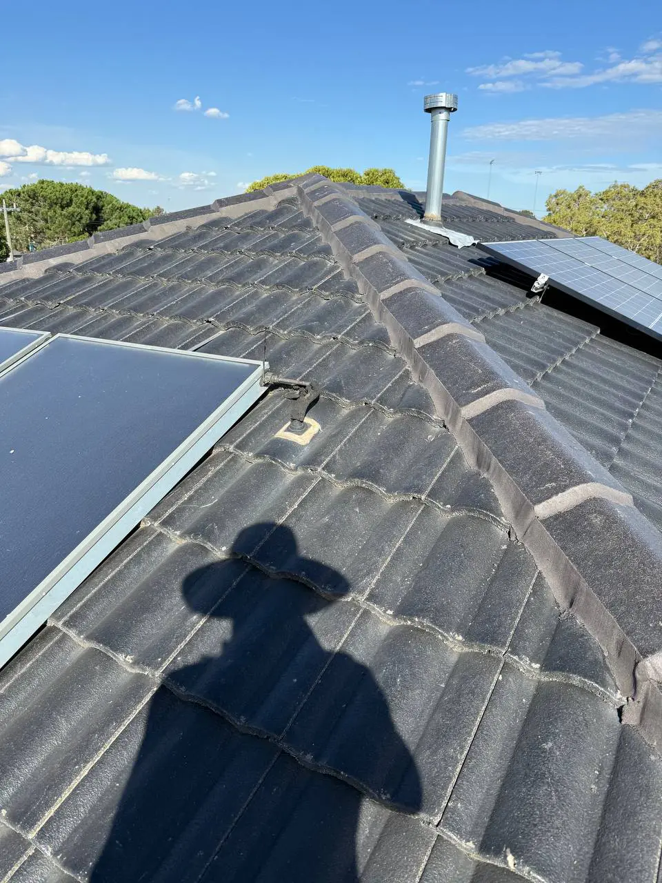 Concrete tile roof restored and resprayed in charcoal, Melbourne — project 16