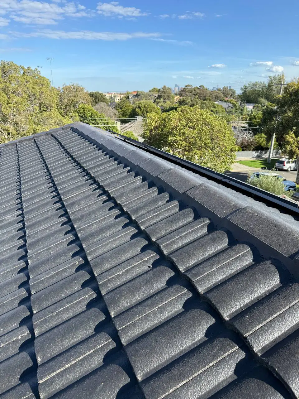 Concrete tile roof restored and resprayed in charcoal, Melbourne — project 17