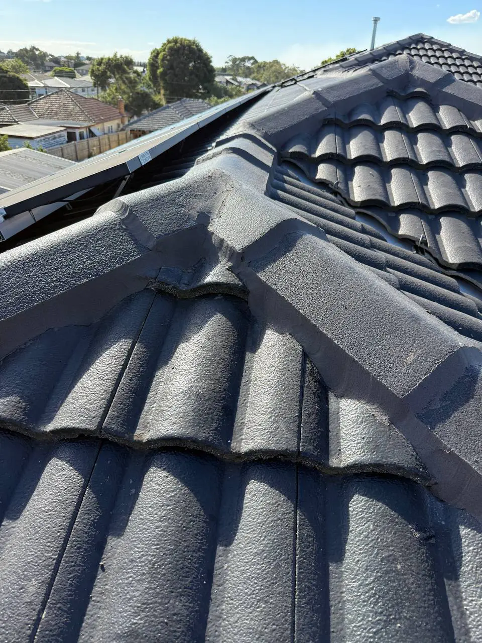 Concrete tile roof restored and resprayed in charcoal, Melbourne — project 18