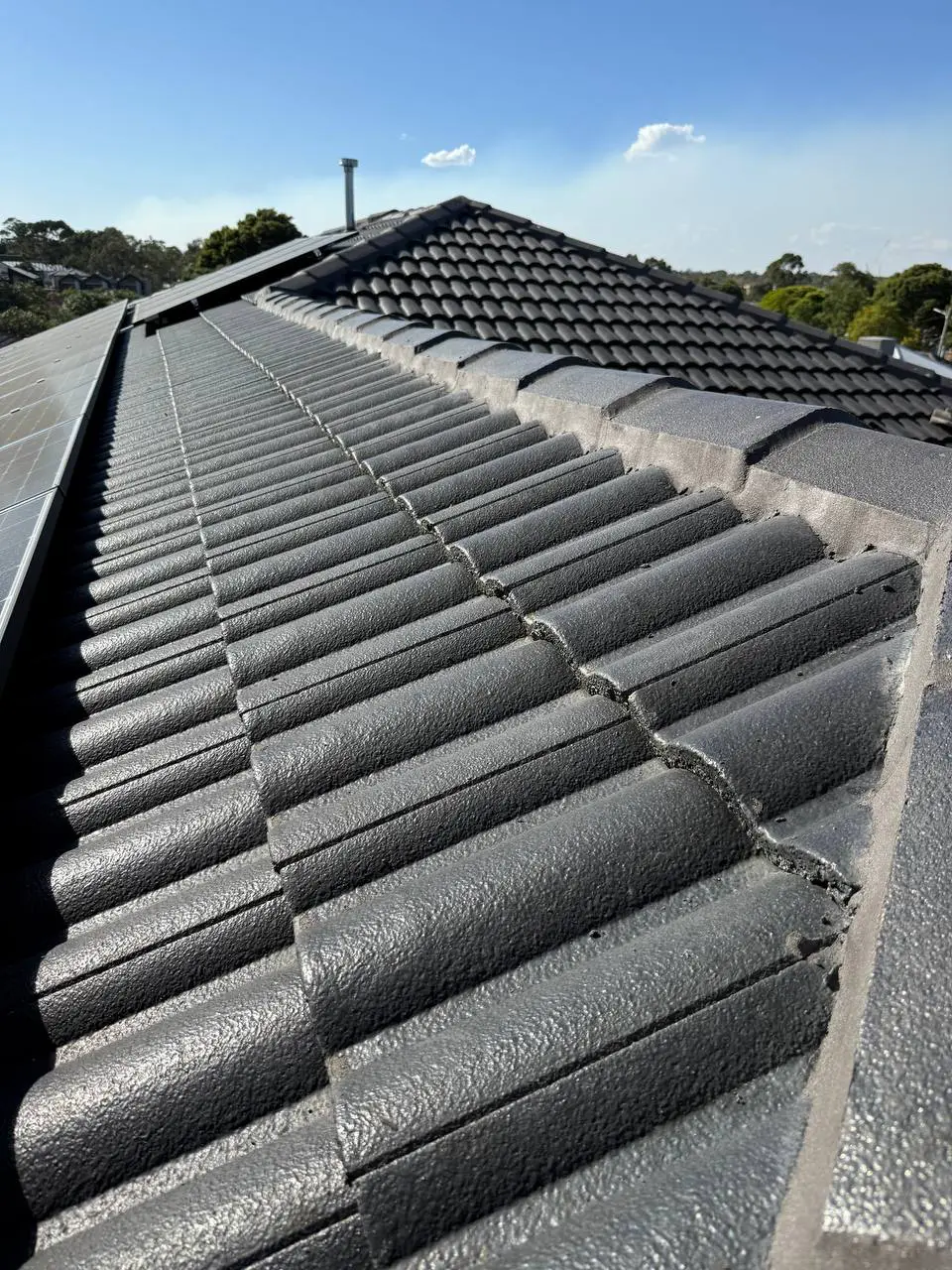 Concrete tile roof restored and resprayed in charcoal, Melbourne — project 19