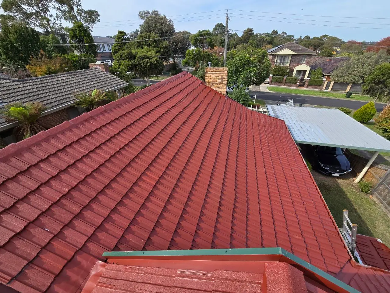 Restored terracotta tile roof with fresh ridge capping, Melbourne — project 2