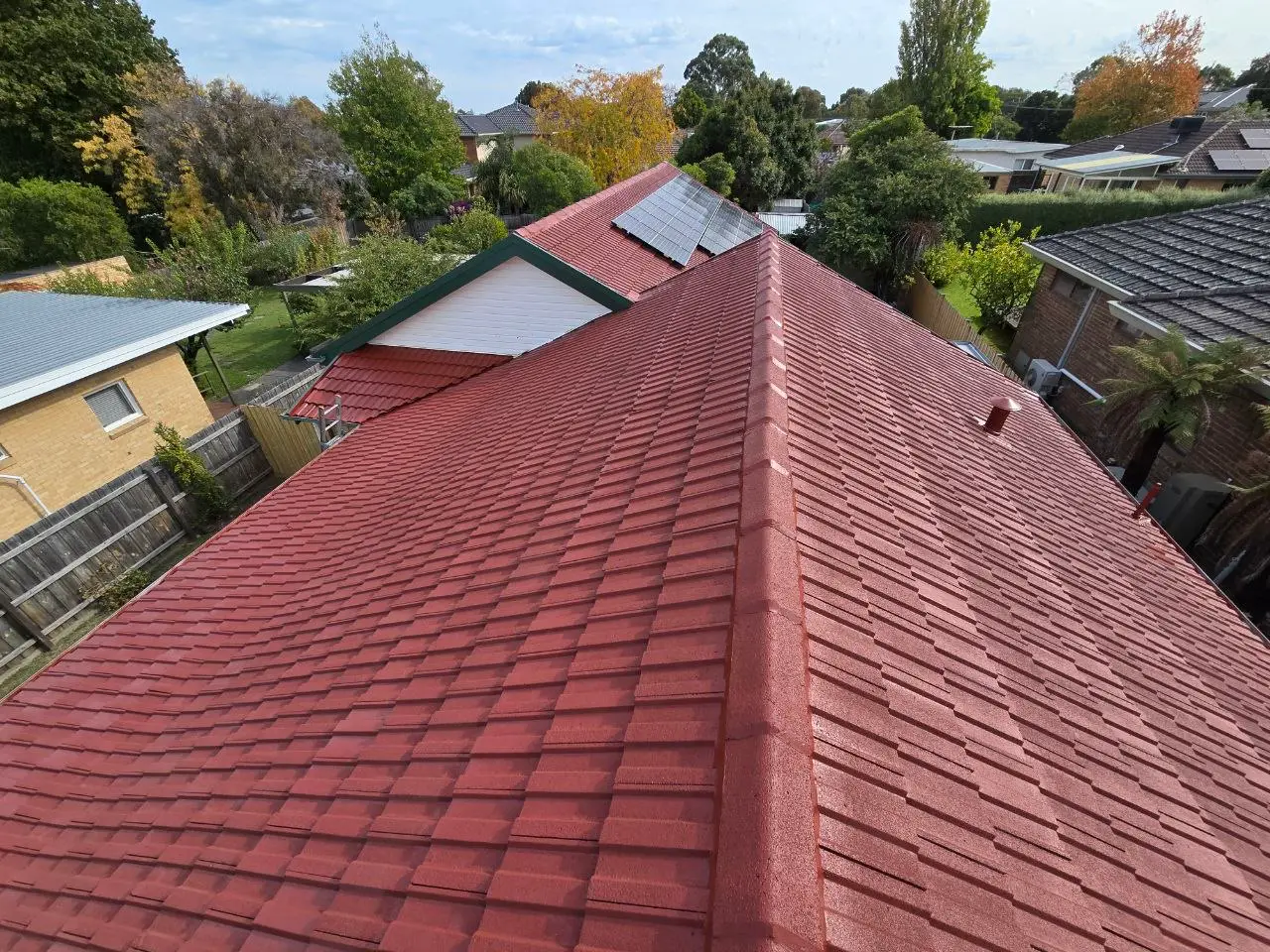 Restored terracotta tile roof with fresh ridge capping, Melbourne — project 4
